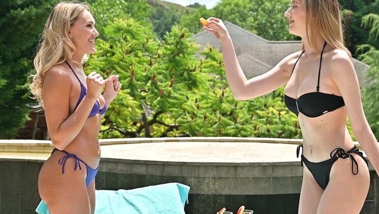 Polly Persch and Polly Yangs share a glass dildo poolside